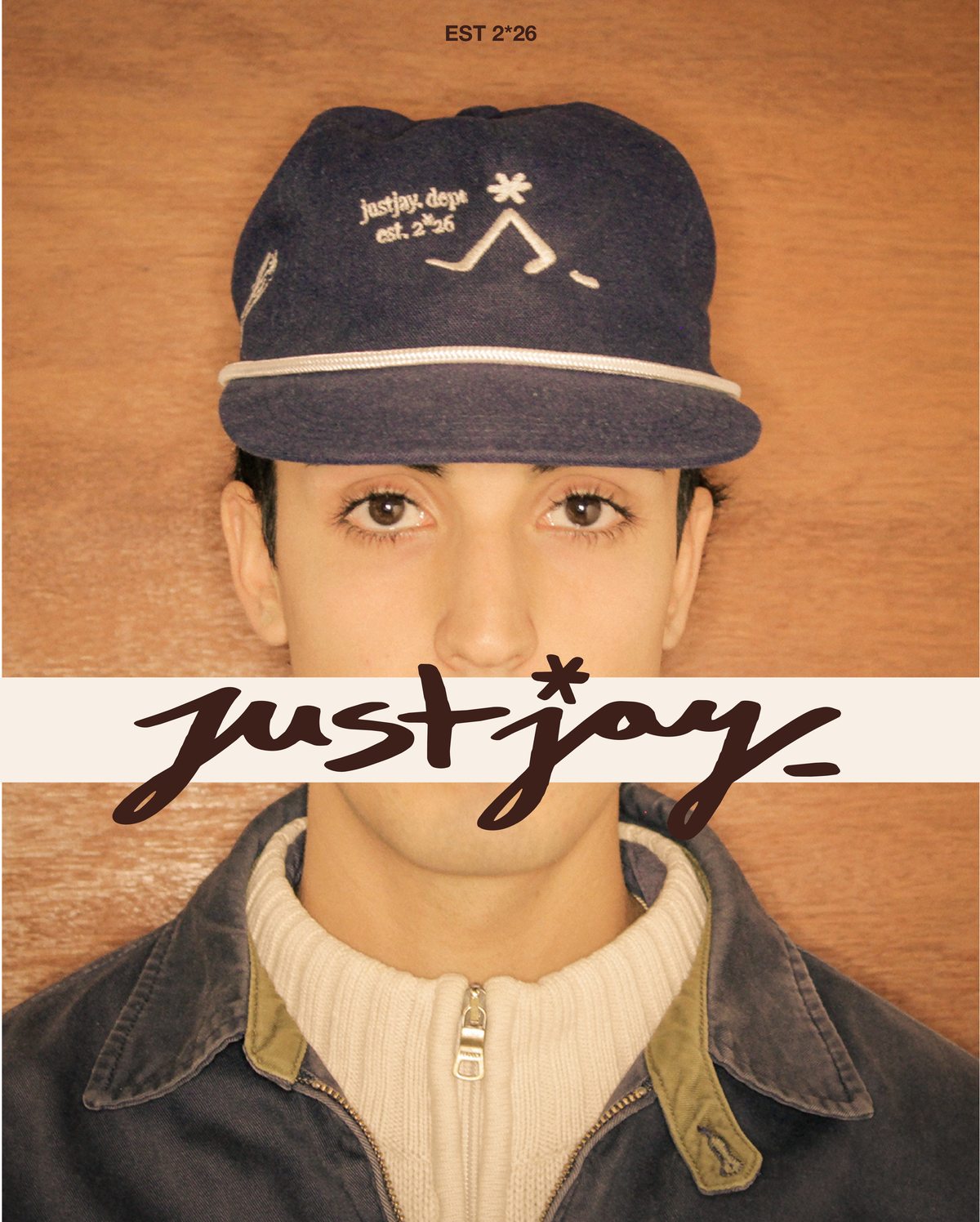 Editorial justjay. — retrato con el wordmark